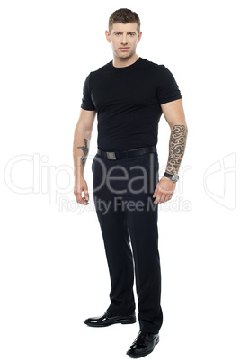 Strong male bouncer. Tattoo on both his hands
