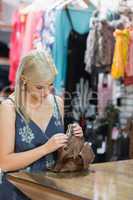 Woman taking purse out of handbag