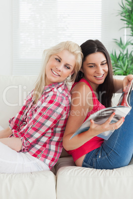 Women looking at a magazine