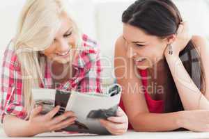 Women looking at magazine