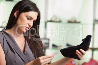Woman  looking at the price tag