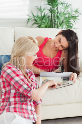 Women looking at a catalog