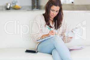 Woman checking receipts