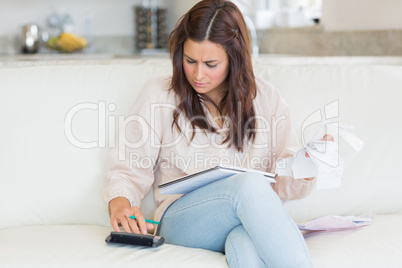 Woman calculating bills
