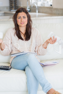 Woman feeling frustrated about the bills