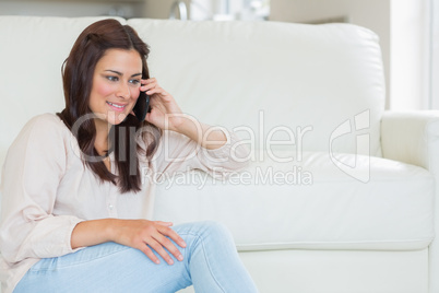 Woman calling in the living room