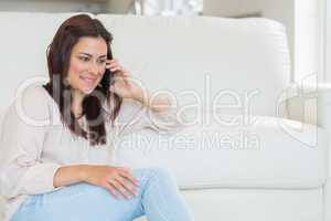 Woman calling in the living room