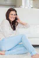 Woman smiling while calling