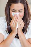 Sick woman with tissue