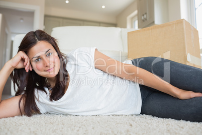 Brunette lying on the floor