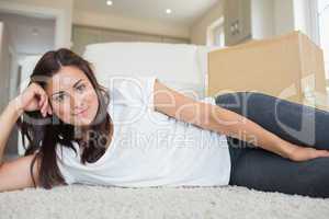 Brunette lying on the floor