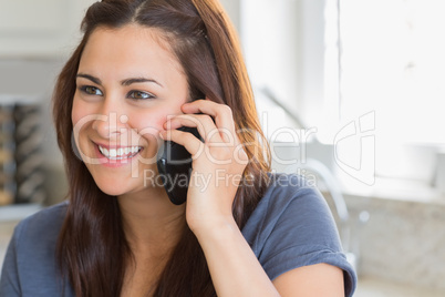 Smiling woman calling