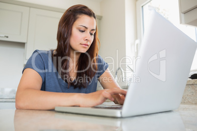 Young woman using laptop