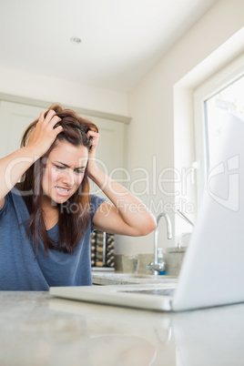 Angry woman with laptop
