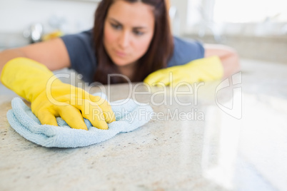 Woman wiping counter