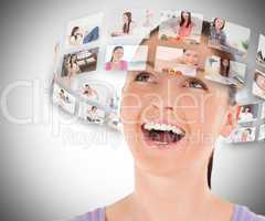 Woman viewing pictures around her head