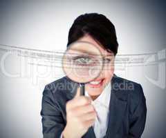 Woman holding magnifying glass