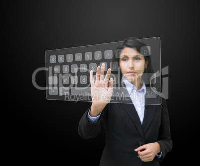 Woman typing on digital keyboard