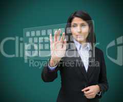 Businesswoman touching projected digital keyboard