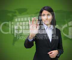 Woman touching digital keyboard against green background