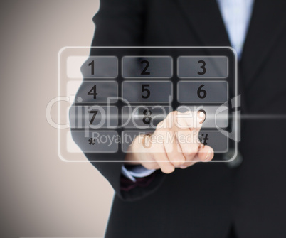 Woman entering a code on digital number pad