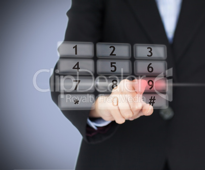 Woman pressing number on digital number pad