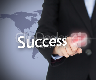 Businesswoman touching on the success button