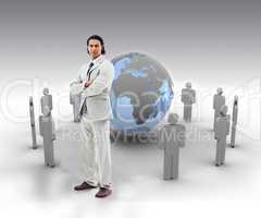 Businessman standing in front of a blue globe with stick figures