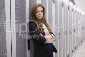 Female worker in data storage facility