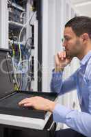 Man doing maintenance of servers