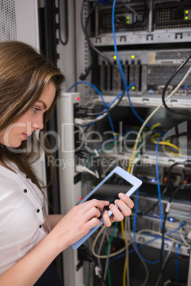 Concentrated woman doing data storage