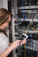 Concentrated woman doing data storage