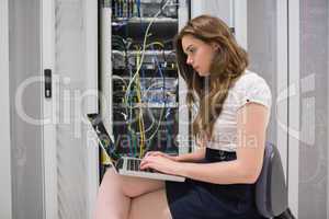 Female technician doing data storage