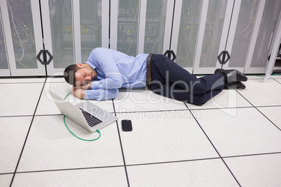 Man sleeping in data center