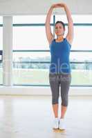 Woman standing in yoga pose