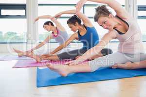 Women stretching on the floor