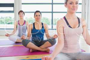 Women sitting in easy yoga pose
