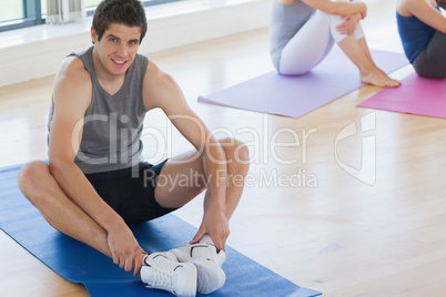 Man at yoga class