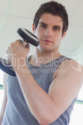 Man holding dumbbell