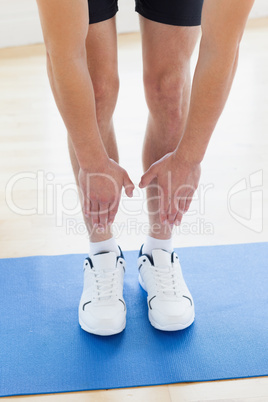 Man stretching to his toes