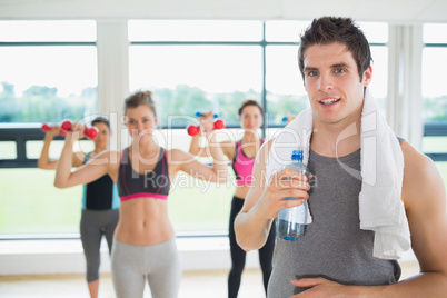 Man taking break from aerobics class