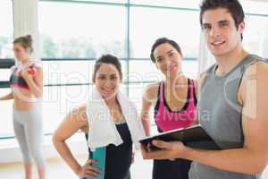 Trainer and women smiling