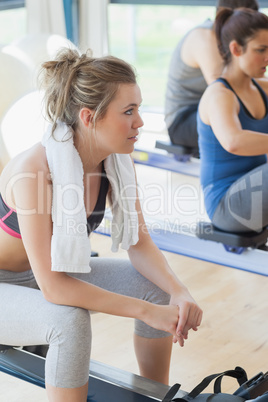 Woman taking a break from the row machine