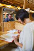Man sitting at study desk