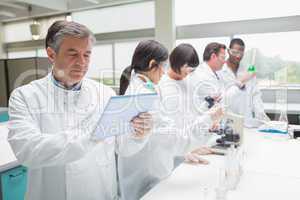 Chemist using tablet pc