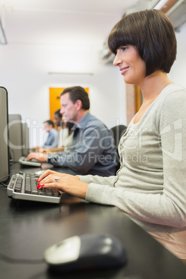 Woman typing on the computer