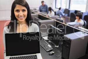 Woman presenting a laptop