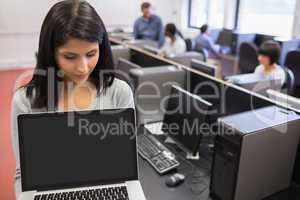 Woman showing a laptop