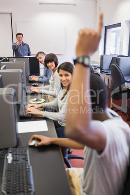 Student raising his hand