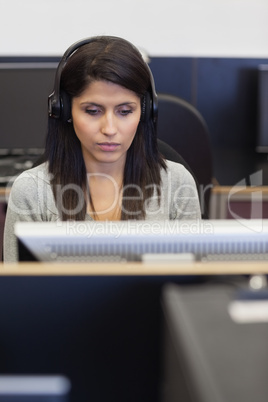 Woman working in computer room